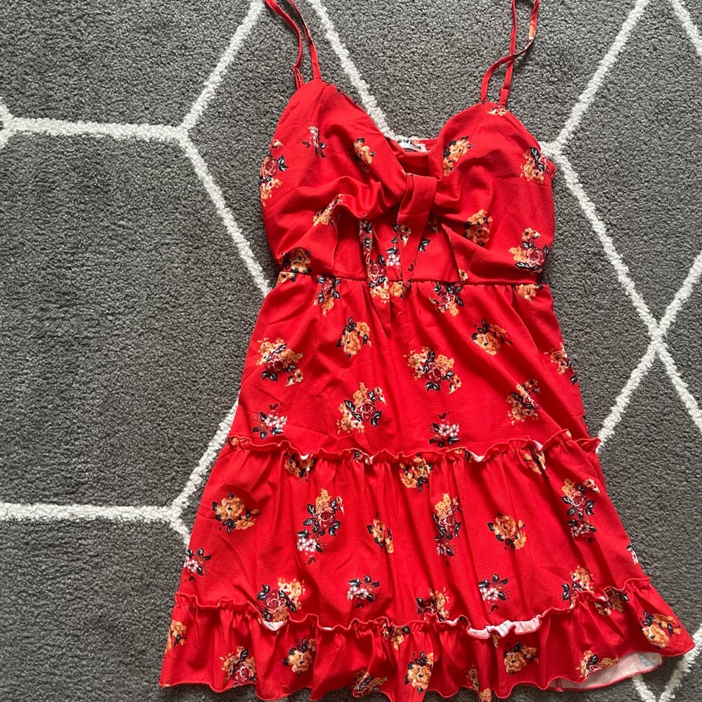 Red with yellow flowers mini dress with adjustable straps and front chest tie